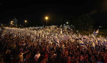 Thousands march in Israel as former officials beg Netanyahu to halt judicial overhaul