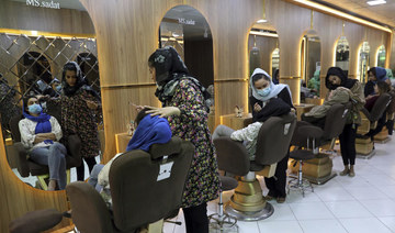 Taliban use stun guns, fire hoses and gunfire to break up Afghan women protesting beauty salon ban