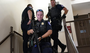 US Capitol Police officers clear a stairwell in the Dirksen Senate Office Building next to Russell Senate Office Building.
