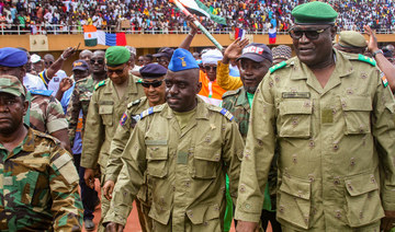 Members of a military council that staged a coup in Niger attend a rally at a stadium in Niamey, Niger, August 6, 2023. (Reuters