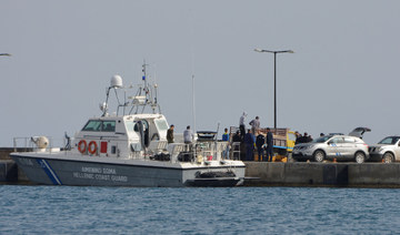 Greece’s coast guard rescues 52 people from migrant sailboat anchored off remote uninhabited island