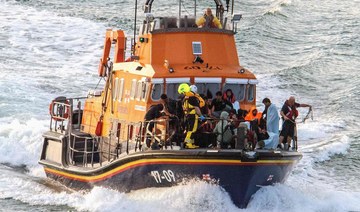Migrants picked up at sea while attempting to cross English Channel, are brought by a lifeboat into the Marina in Dover