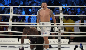 Low-blow call helps Usyk come back to KO Dubois and keep heavyweight boxing titles