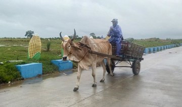 Hundreds flee floods as super typhoon brushes past Philippines