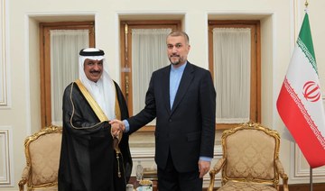 Saudi Arabia’s new ambassador to Iran Abdullah bin Saud Al-Anazi presents a copy of his credentials in Tehran.