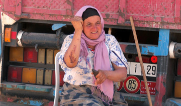 Fatima Boujdig, an earthquake survivor, shows her wounds in Tafeghaghte, a remote village of the High Atlas mountains. (Reuters)