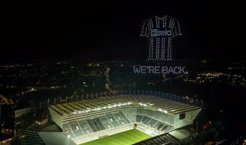 Front-of-shirt sponsor celebrates return of European nights by lighting up the skies. Credit: Owen Humphreys/PA Wire