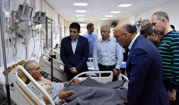 Syria’s health minister visits injured individuals in the aftermath of a drone attack targeting Syrian military academy in Homs.