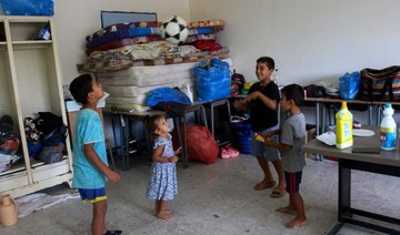 Children from Beit Leef village play footall in a classroom of a school where displaced Lebanese families are sheltering. 