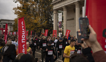 Thousands of Ukrainians run to commemorate those killed in the war