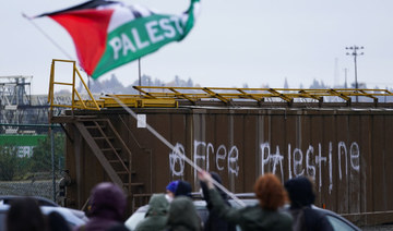 Protesters calling for Gaza ceasefire block road at Tacoma port while military cargo ship docks