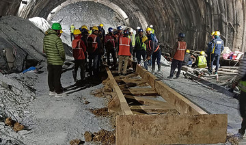 Indian rescuers battle for third day to free 40 trapped tunnel workers