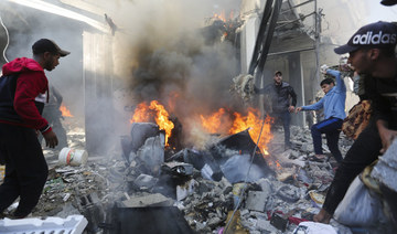 Palestinians look for survivors after an Israeli strike on Rafah, Gaza Strip, Friday, Nov. 17, 2023. (AP)