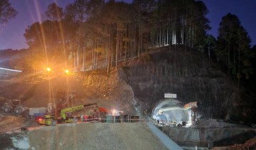 Rescuers drill to send more food to trapped workers in Indian tunnel