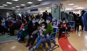 China grapples with respiratory illness spike; WHO says no unusual pathogen found