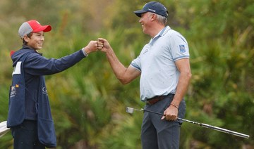 Kuchar and son build 3-shot lead. Tiger Woods and son have to settle for a nice family affair