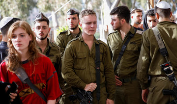 A weekend of combat in Gaza kills 14 Israeli soldiers as public support for the war is tested