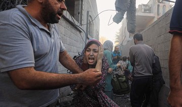 People flee following Israeli air strikes on a neighbourhood in the Al-Maghazi refugee camp in the central Gaza Strip. (File/AFP