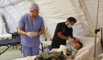 Doctors treat patients at a Jordanian military field hospital in the besieged Gaza Strip. (Supplied)