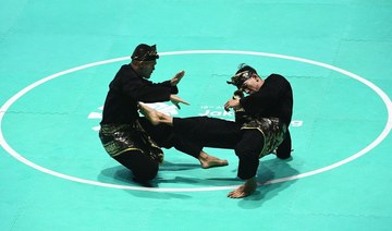 Two Indonesian martial artists perform at the 2018 Asian Games in Jakarta on Aug. 28, 2018. (INASGOC)