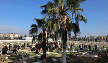 Palestinians rebury bodies exhumed from Gaza cemetery