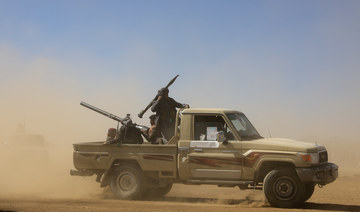 A pick-up truck carrying Houthi supporters can be seen near Sanaa, Yemen January 14, 2024. (Reuters)