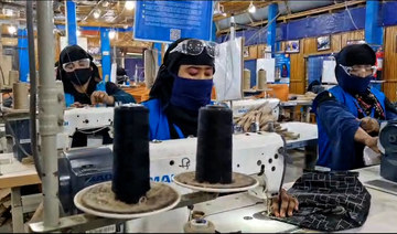 Rohingya refugee women operate the sewing machine at the Jute Bag Production Center in Kutupalong Refugee Camp, Cox’s Bazar.
