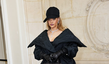 Rihanna graces Dior show in Amina Muaddi heels 