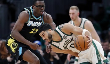 Celtics hold off Pacers rally, Lakers slump again