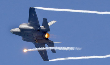 An Israeli F-35 fighter jets performs during an air show, over the beach in the Mediterranean coastal city of Tel Aviv. (AFP)