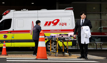 Overworked and unheard, South Korean doctors on mass walkout say