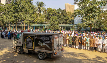 Grieving families await bodies after Dhaka restaurant blaze