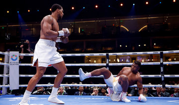 Anthony Joshua knocks out MMA star Francis Ngannou in one-sided boxing match