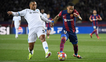 Barca edge past Napoli to make Champions League quarters return