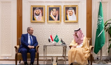 Saudi Foreign Minister Prince Faisal bin Farhan receives his Syrian counterpart Faisal Mekdad in Riyadh on Thursday. (SPA)