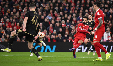 Liverpool rout Sparta to reach Europa League quarterfinals. Late goals propel Leverkusen