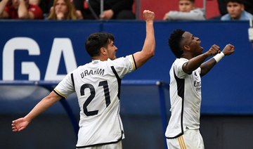 Vinícius scores twice in 4-2 win at Osasuna as Madrid take another step toward title