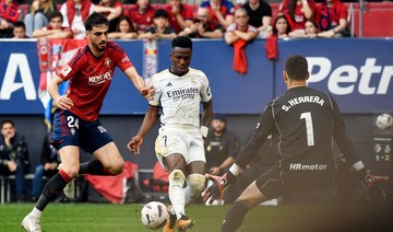 Vinicius scores twice in easy win at Osasuna as Madrid take another step toward title