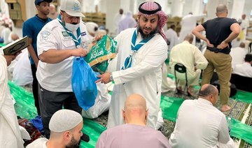 Volunteer teams serving visitors at Two Holy Mosques