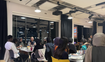 Participants enjoy a three-course vegetarian meal of soup, bread, aromatic rice with curry, salads, and traditional desserts.