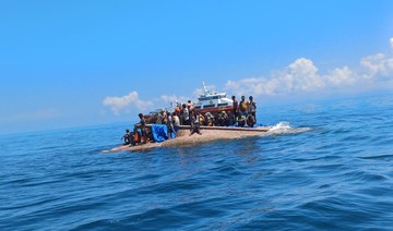 Indonesian rescuers scramble to save Rohingya refugees from capsized boat