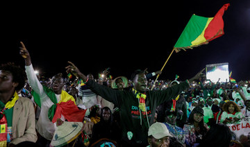 Senegal voters go to the polls in delayed presidential election