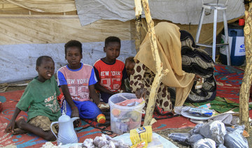 Under siege, Sudanese risk their lives to feed each other