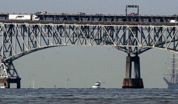 Cargo ship hits Baltimore’s Key Bridge, bringing it down. At least 7 people believed to be in water