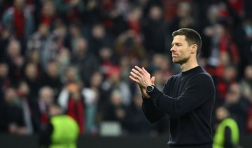 Liverpool target Xabi Alonso says staying as Leverkusen coach