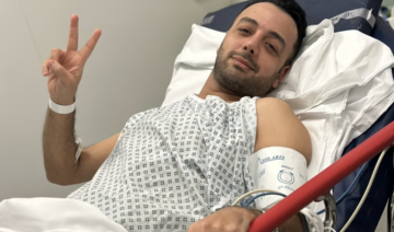 Iranian journalist posts defiant update from hospital bed after knife attack outside London home