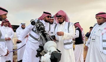 Saudi astronomer Abdullah Al-Khudairi, director of the Astronomy Observatory in Sudair, prepares to sight the crescent moon. 