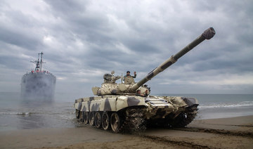 Iranian troops during a military drill in Makran beach on the Gulf of Oman, near the Hormuz Strait. (AFP file photo)