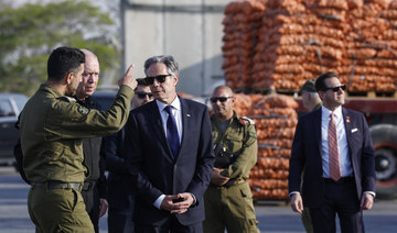 US Secretary of State Antony Blinken walks with Israeli Defense Minister Yoav Gallant, at the Kerem Shalom border crossing.