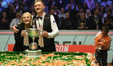 Wilson survives Jones fightback to win World Snooker final